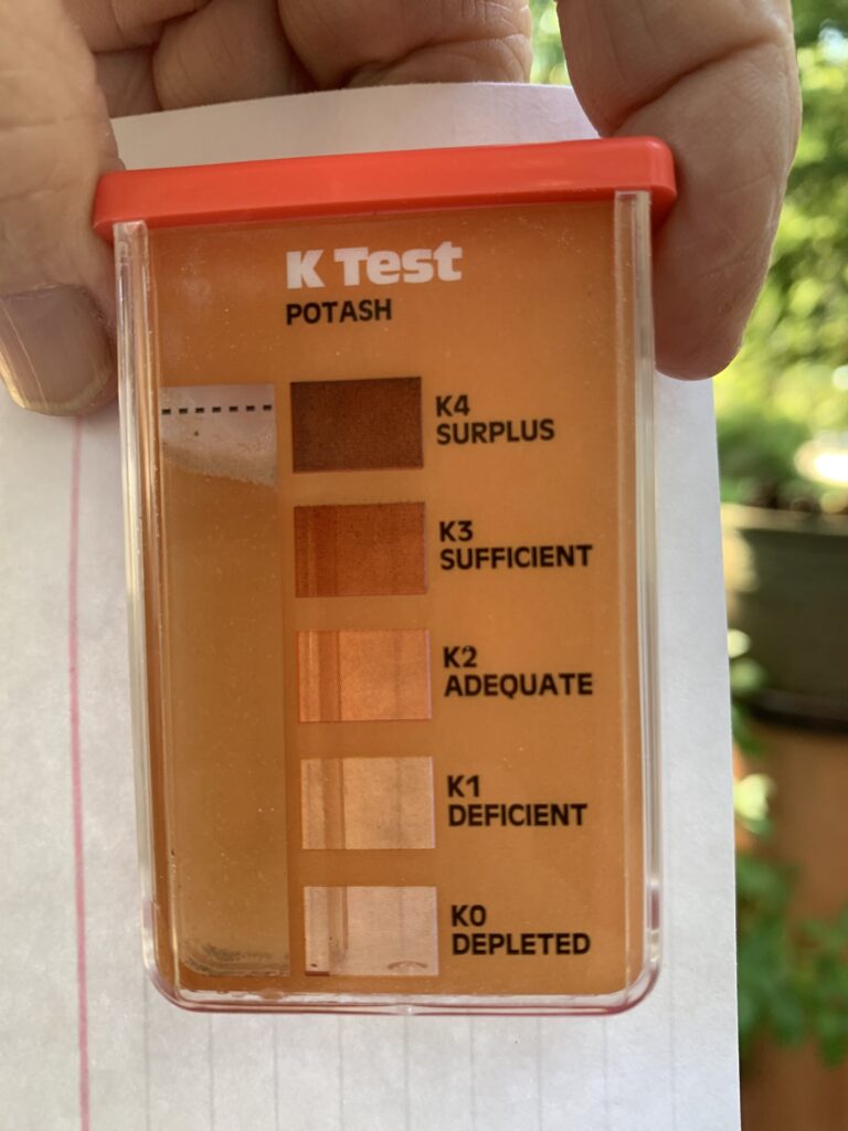 This photo shows the potassium test (K) shows an adequate suppy of potassium in the soil.