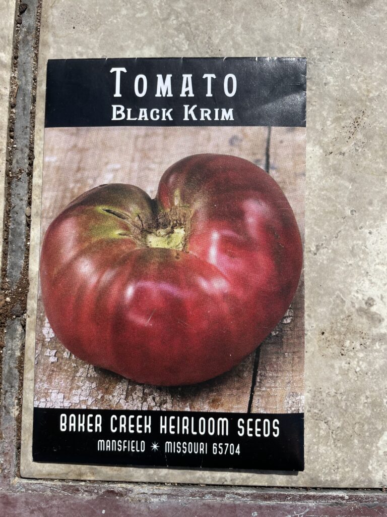 Picture is of a Baker Creek Heirloom Seeds seed packet labeled "Black Krim Tomato".  Black Krim Tomatoes are suggested by A&M Extension Service.  Grow seeds of these tomatoes for successful harvest.  And they're tasty too!